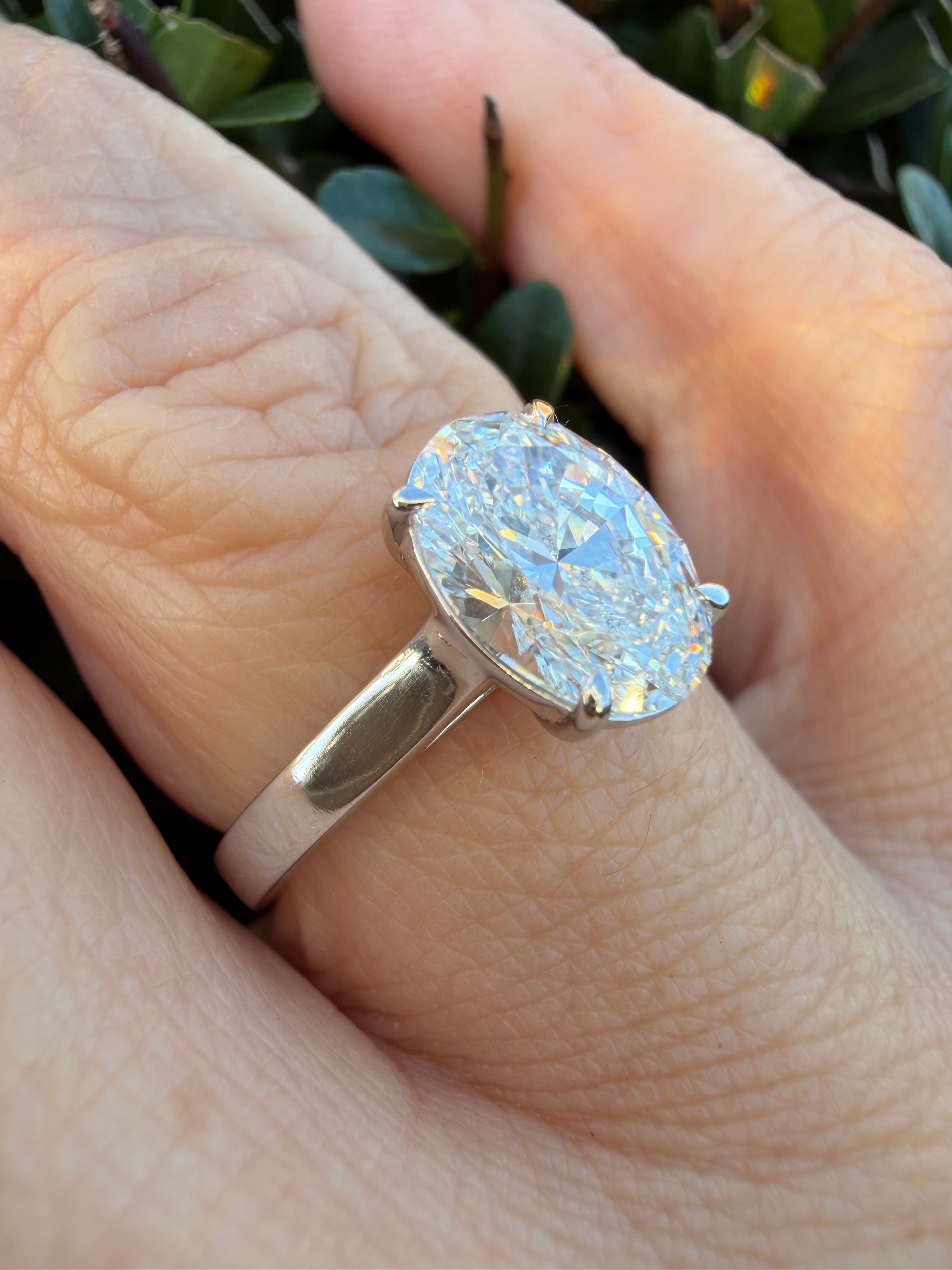 2.01ct oval cut Lab Grown Diamond Solitaire Ring IGI Certified set in 9k white gold