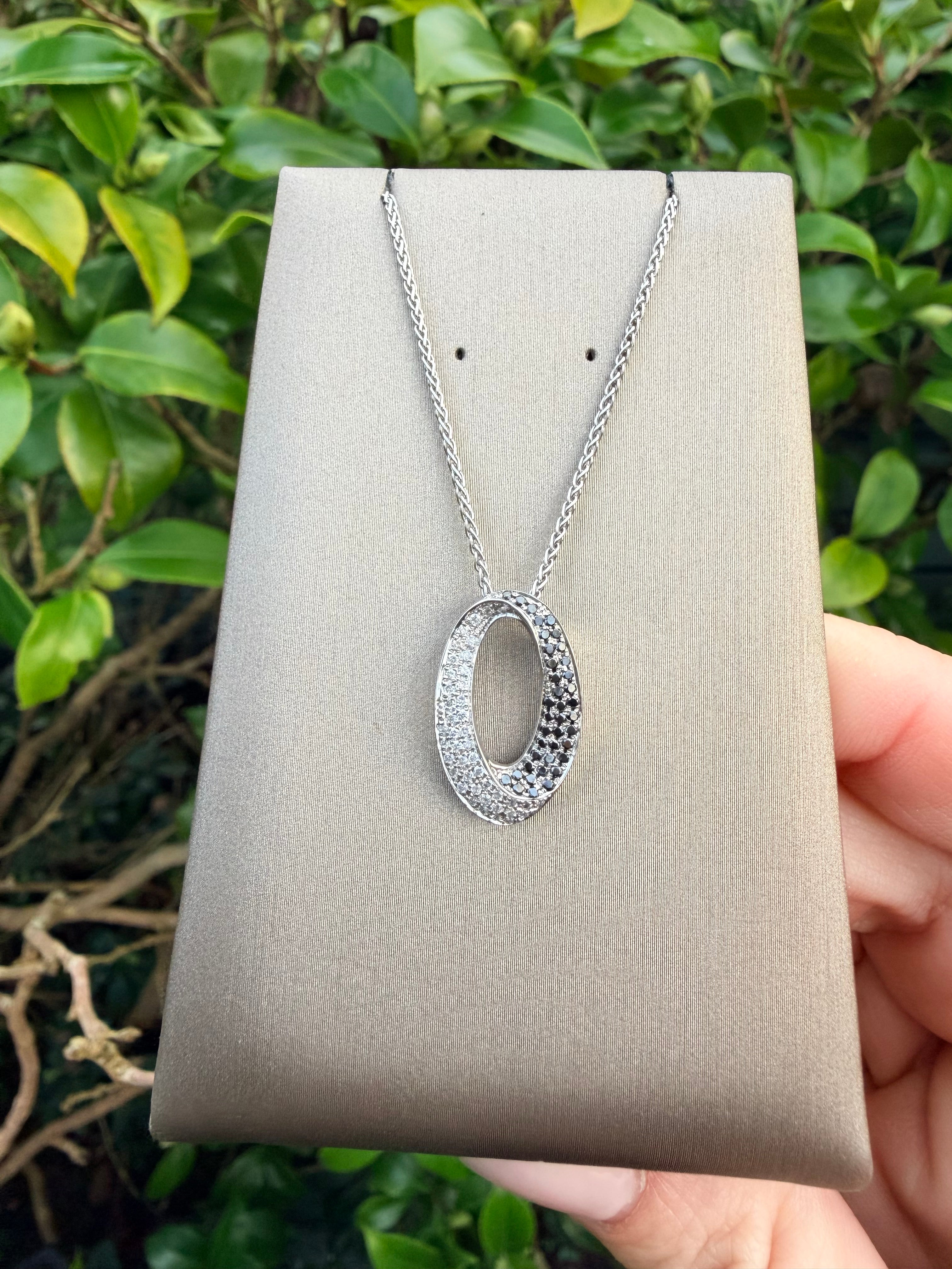 18K White Gold Black And White Diamond Pendant And Chain Set certified