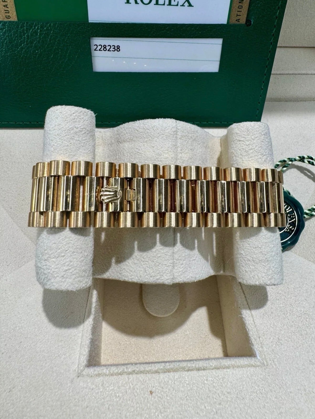 Rolex day date 18k yellow gold 228238 complete with B & P factory champagne baguette diamond dial 2020