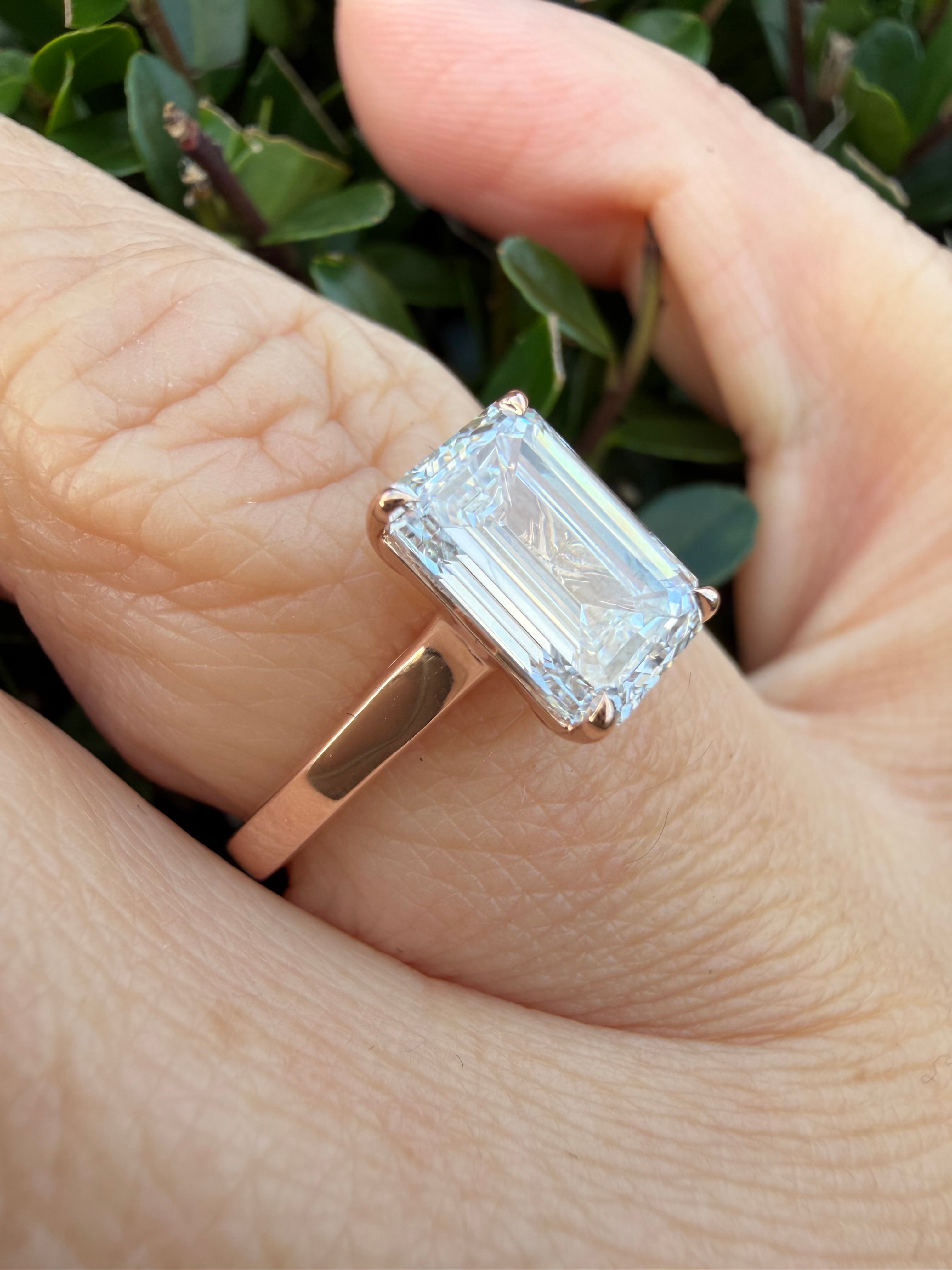 2.12ct emerald cut Lab Grown Diamond Solitaire Ring IGI Certified set in 9k rose gold