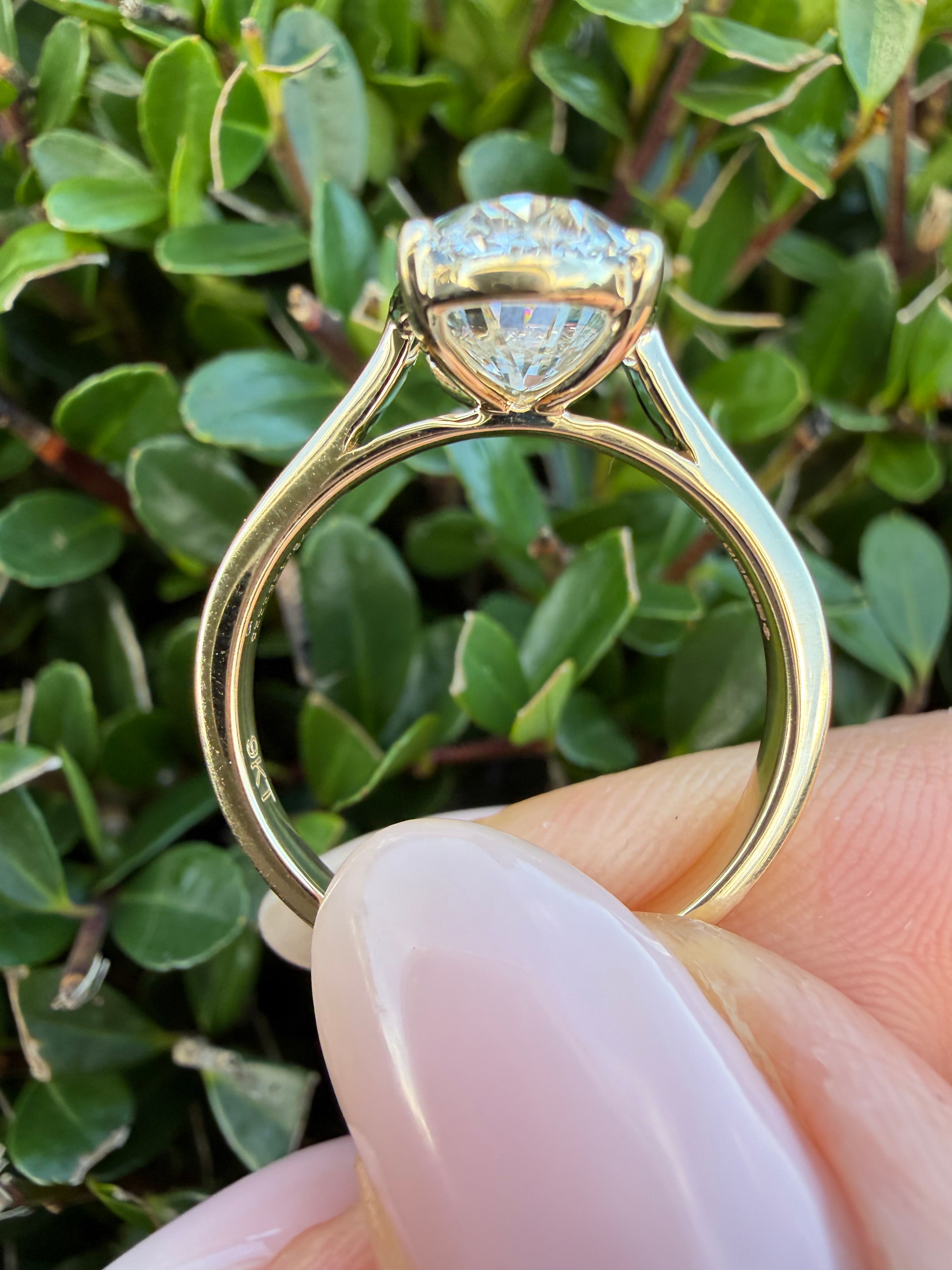 3.07ct oval cut Lab Grown Diamond Solitaire Ring IGI Certified set in 9k rose gold