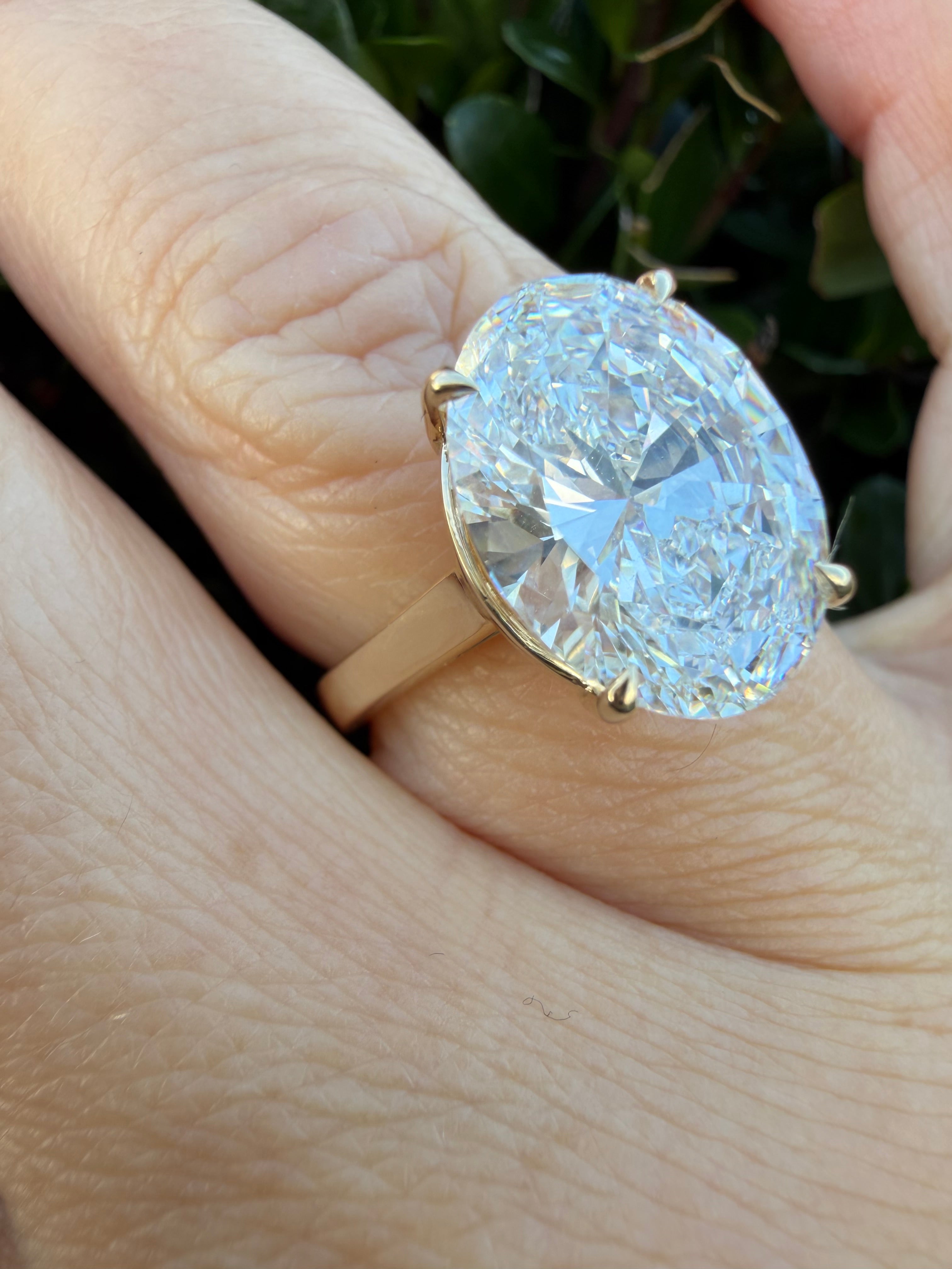 5.01ct Oval brilliant cut Lab Grown Diamond Solitaire Ring IGI Certified set in 9k yellow gold