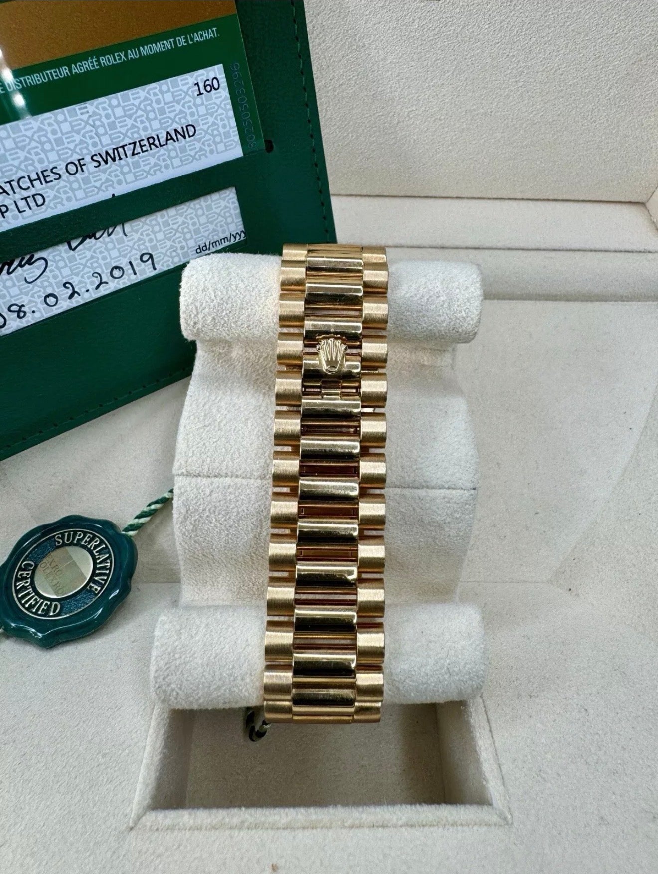 Rolex day date 18k yellow gold 228238 complete with B & P factory champagne baguette diamond dial 2020
