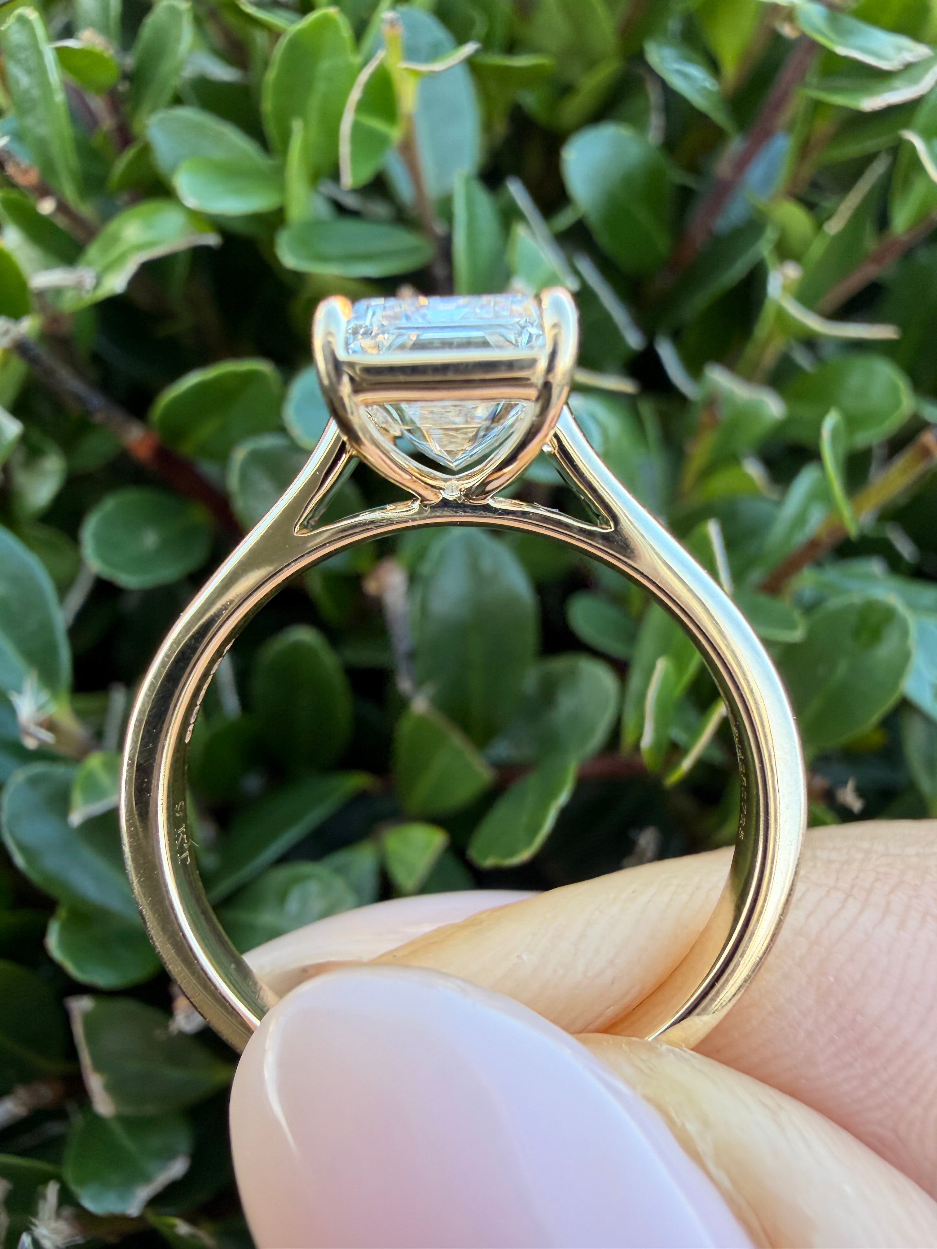 2.08ct emerald cut Lab Grown Diamond Solitaire Ring IGI Certified set in 9k yellow gold