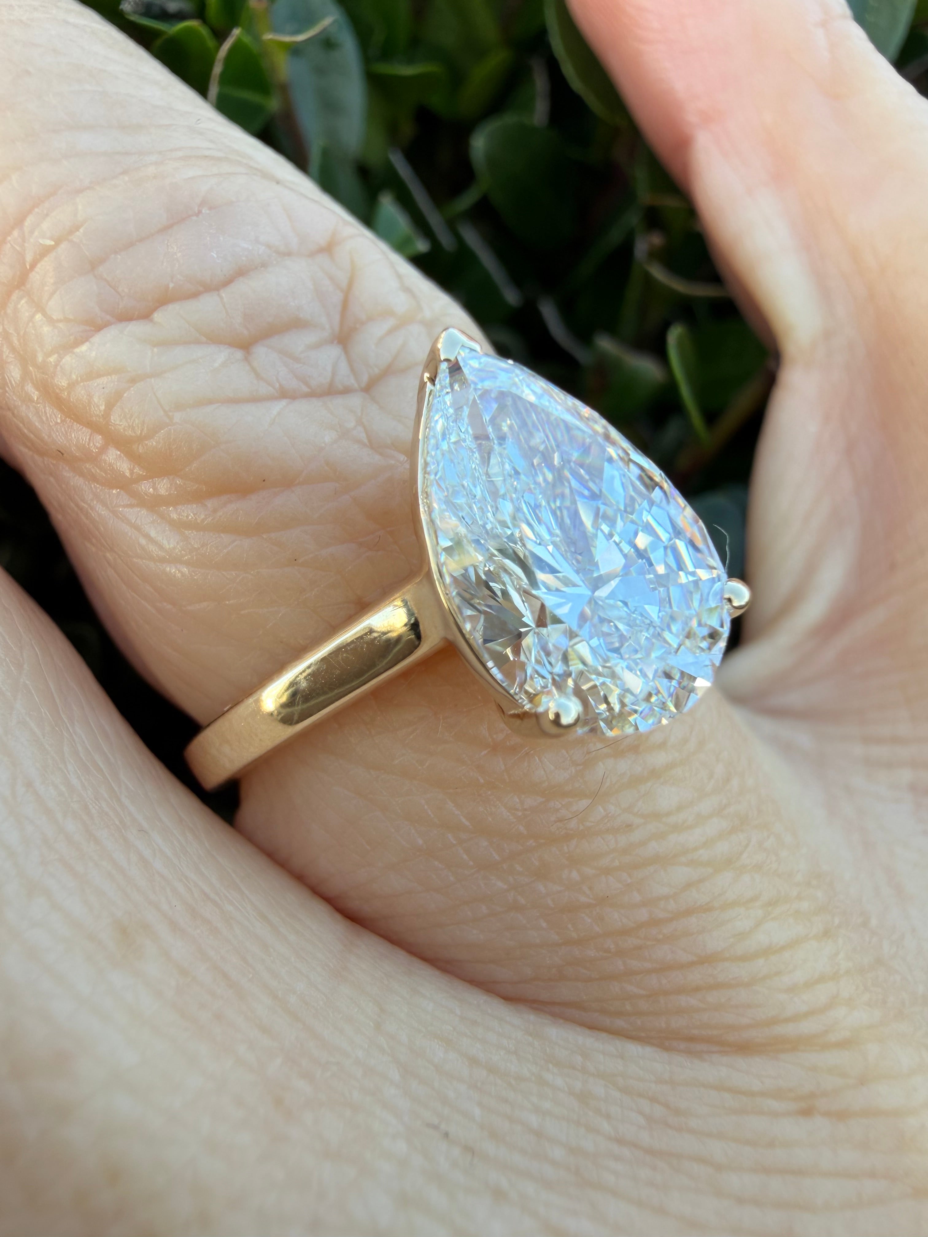 3.01ct pear cut Lab Grown Diamond Solitaire Ring IGI Certified set in 9k yellow gold