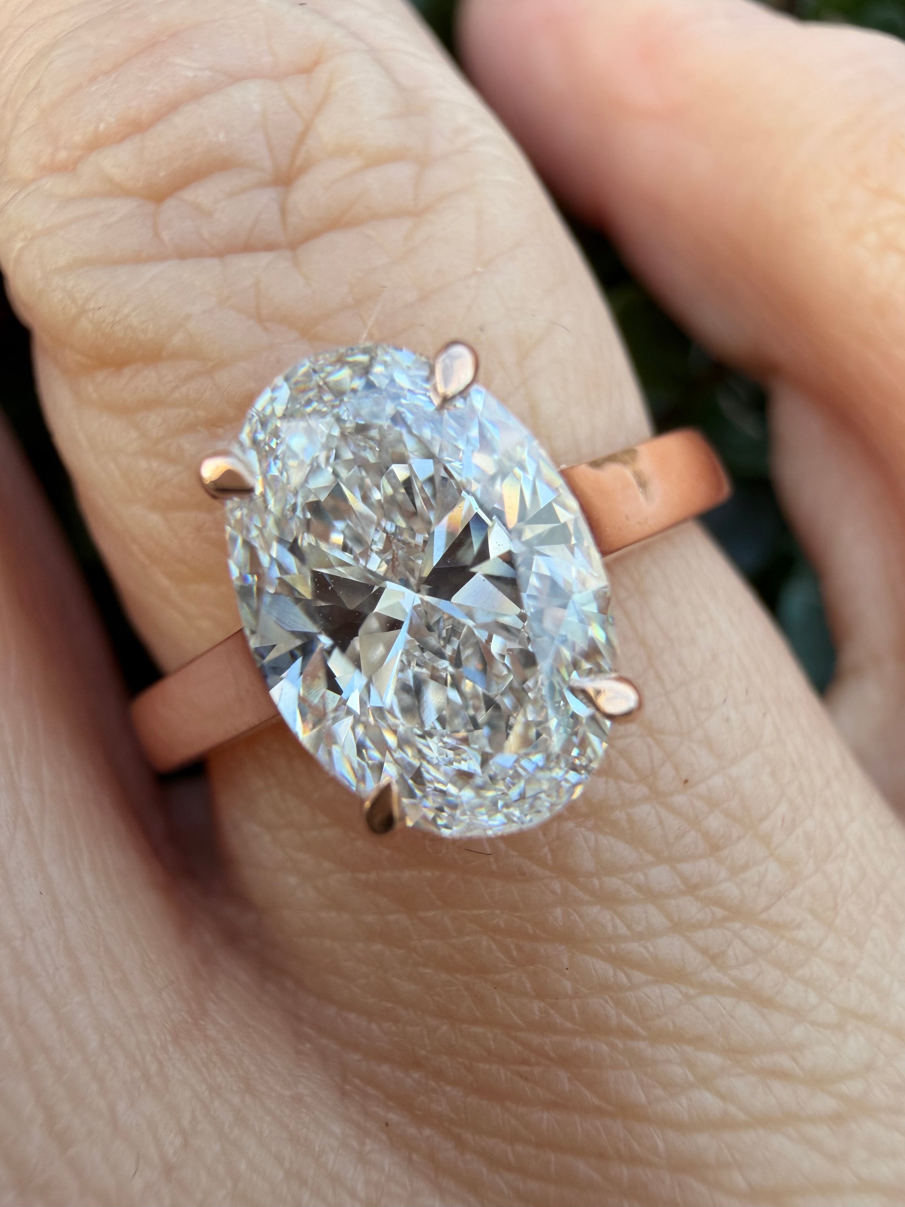 2.01ct oval cut Lab Grown Diamond Solitaire Ring IGI Certified set in 9k rose gold