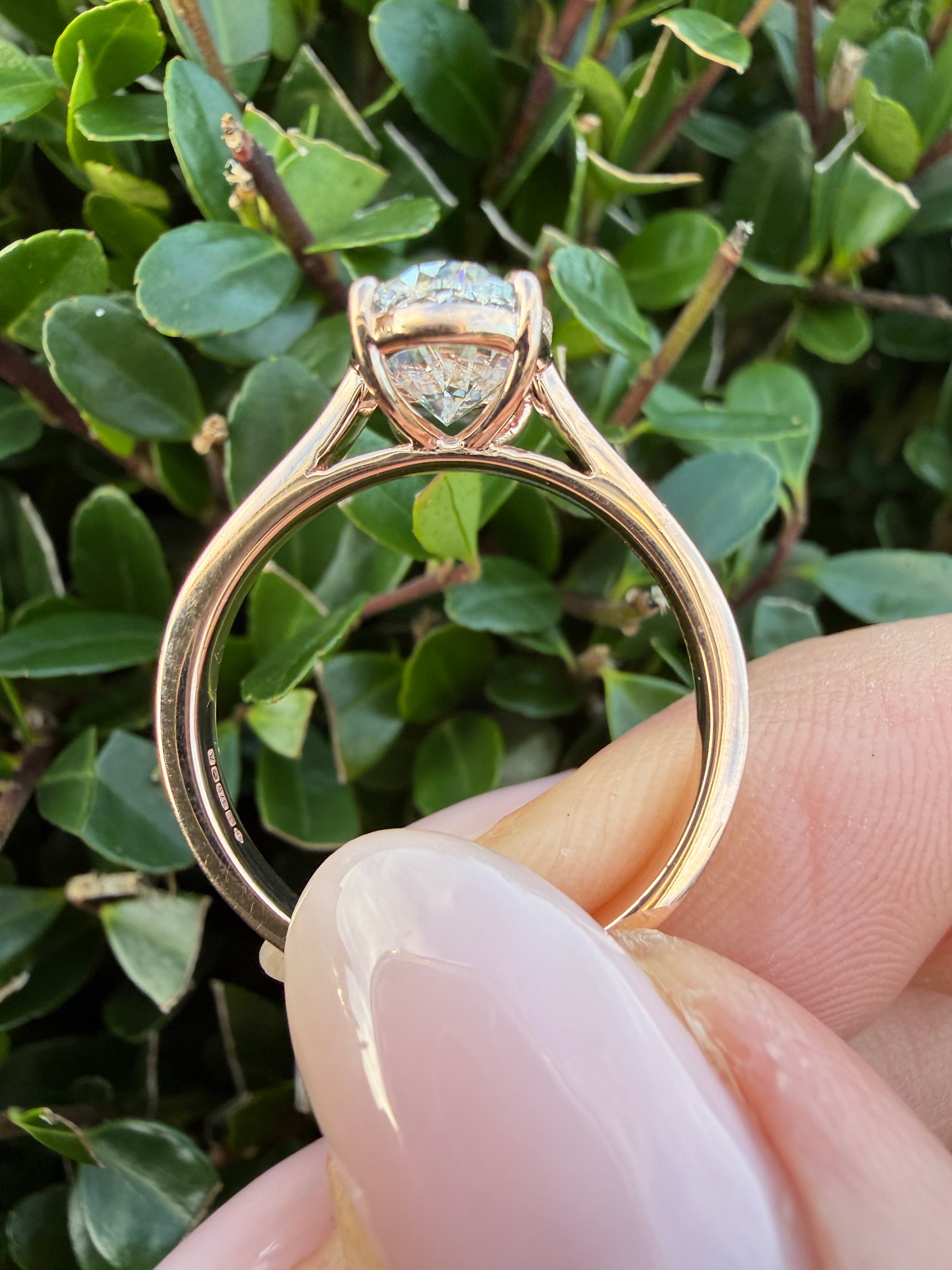 2.01ct oval cut Lab Grown Diamond Solitaire Ring IGI Certified set in 9k rose gold