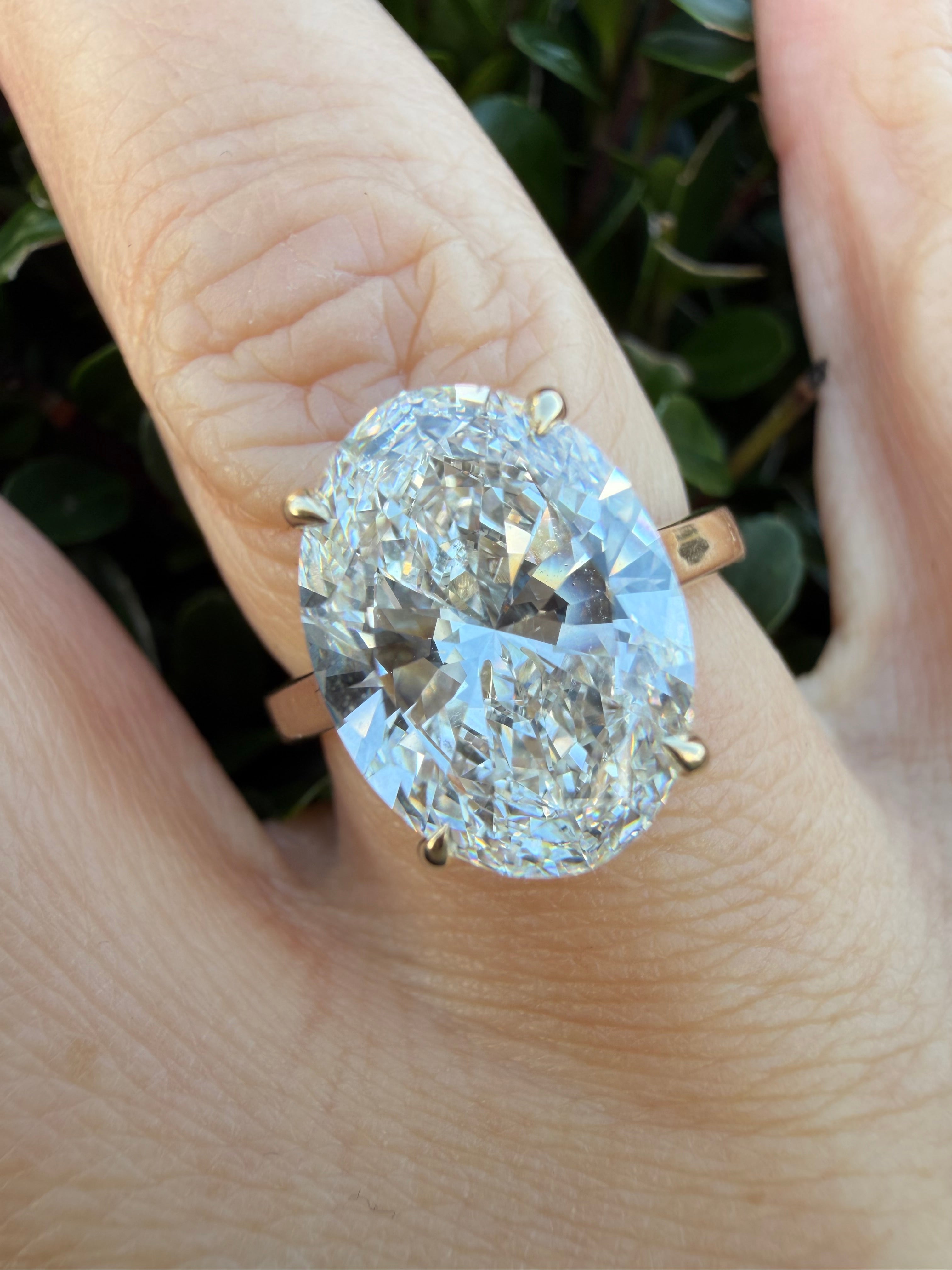 5.01ct Oval brilliant cut Lab Grown Diamond Solitaire Ring IGI Certified set in 9k yellow gold