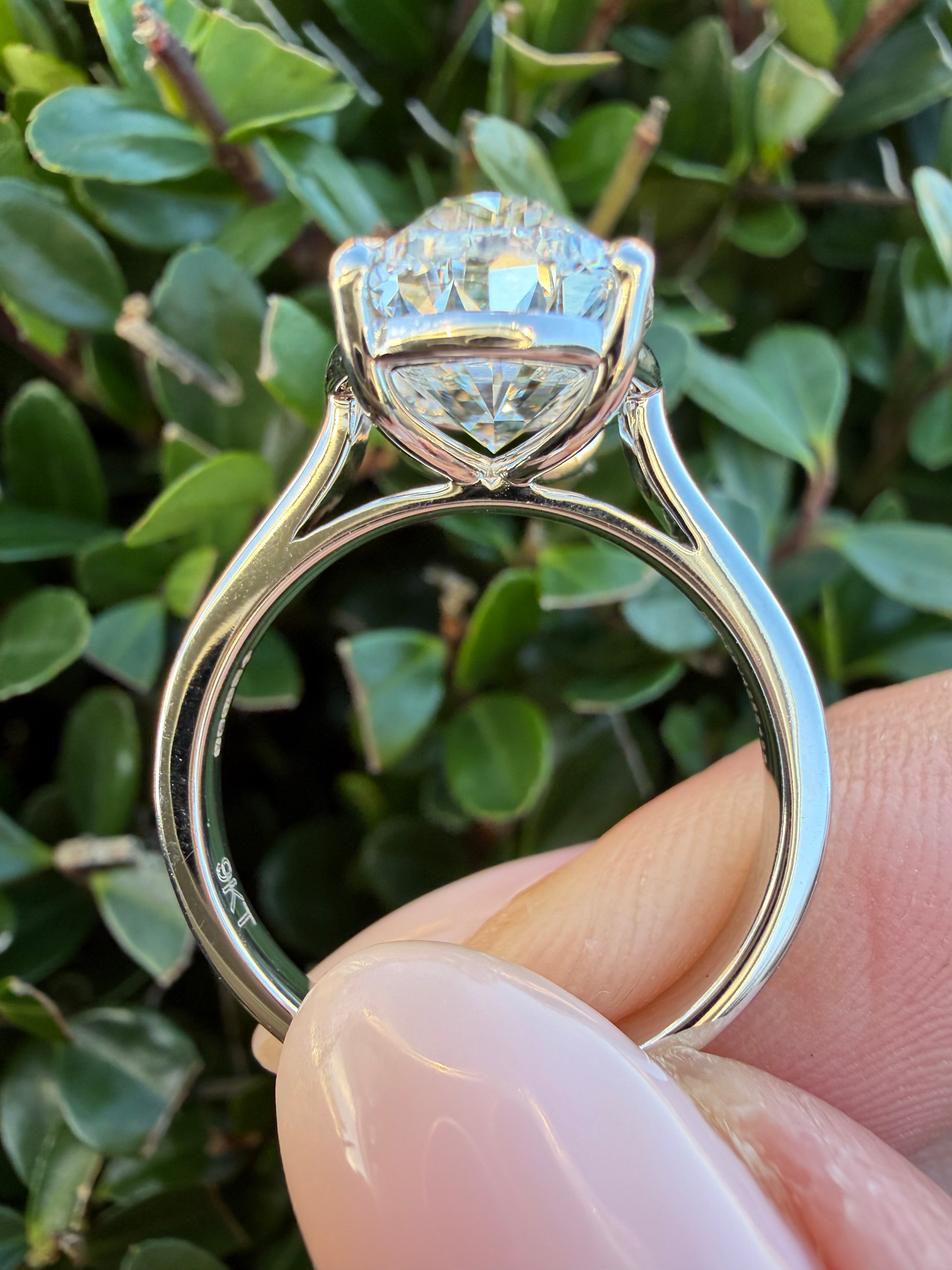 5.01ct Oval brilliant cut Lab Grown Diamond Solitaire Ring IGI Certified set in 9k white gold