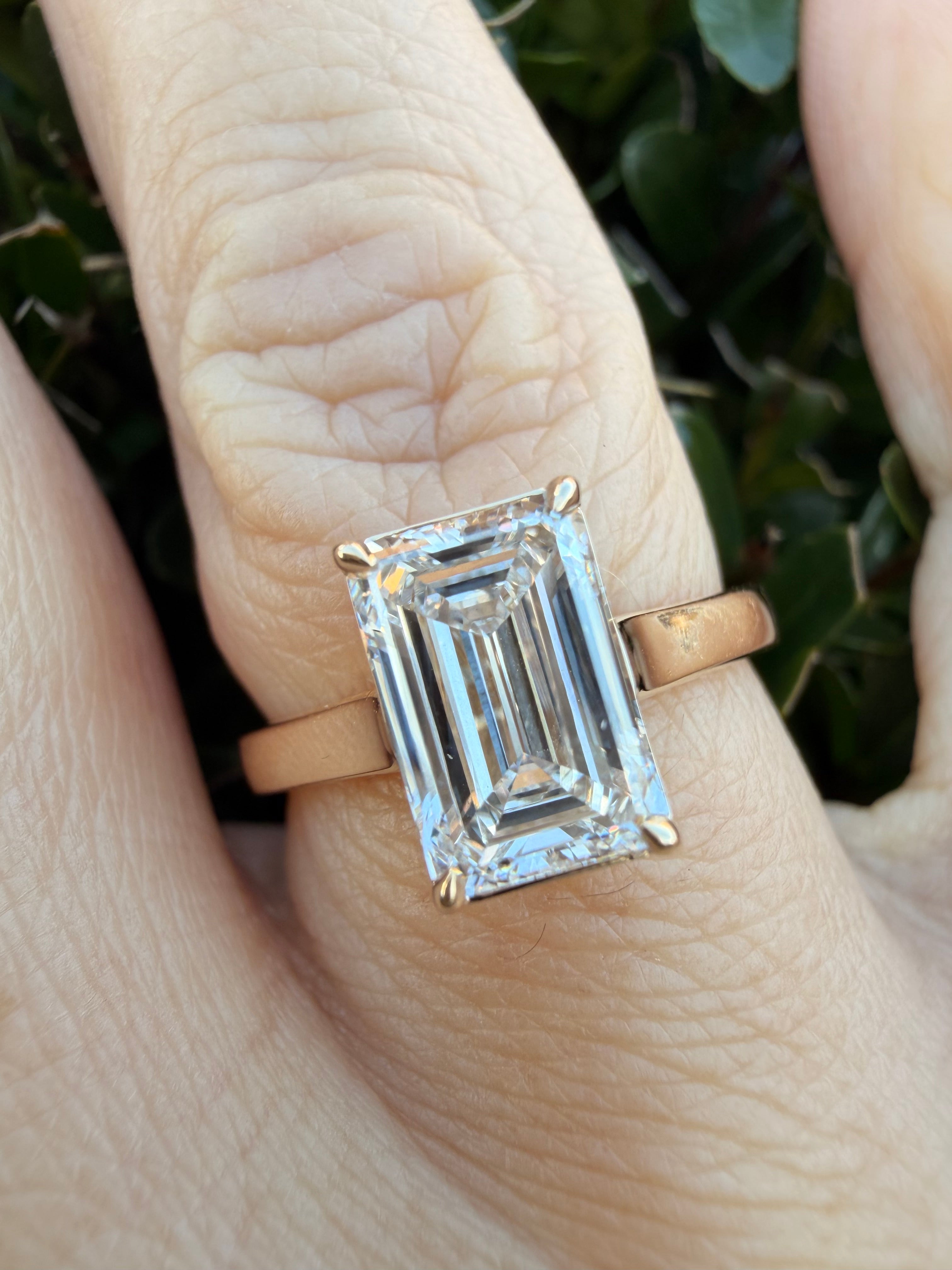 3.01ct emerald cut Lab Grown Diamond Solitaire Ring IGI Certified set in 9k yellow gold