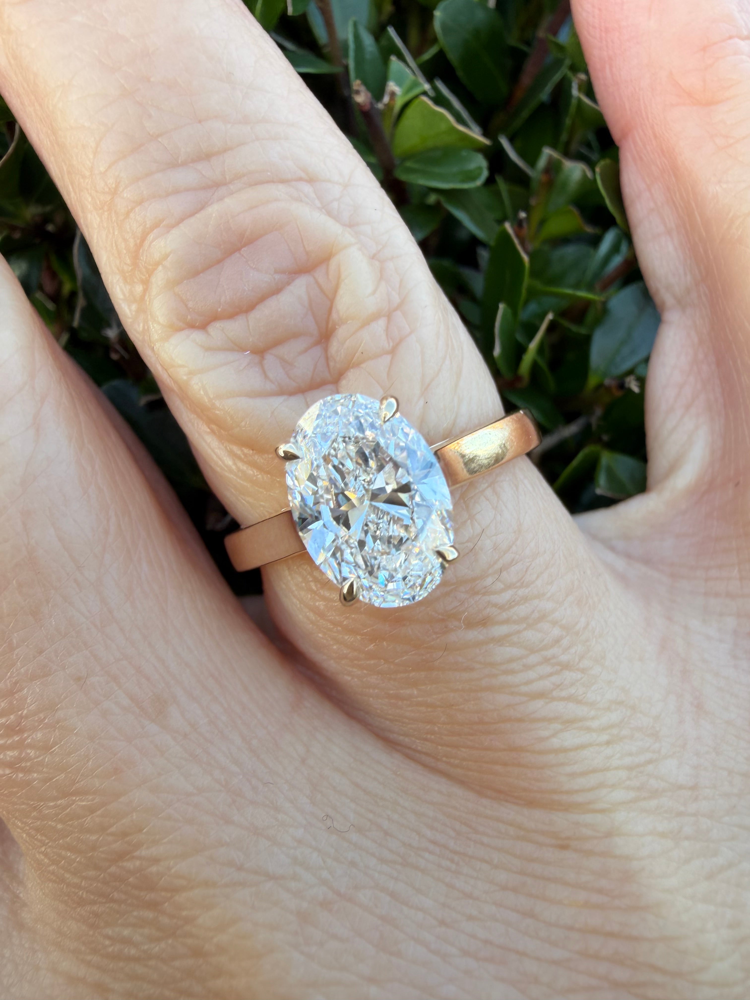 3.07ct oval cut Lab Grown Diamond Solitaire Ring IGI Certified set in 9k rose gold