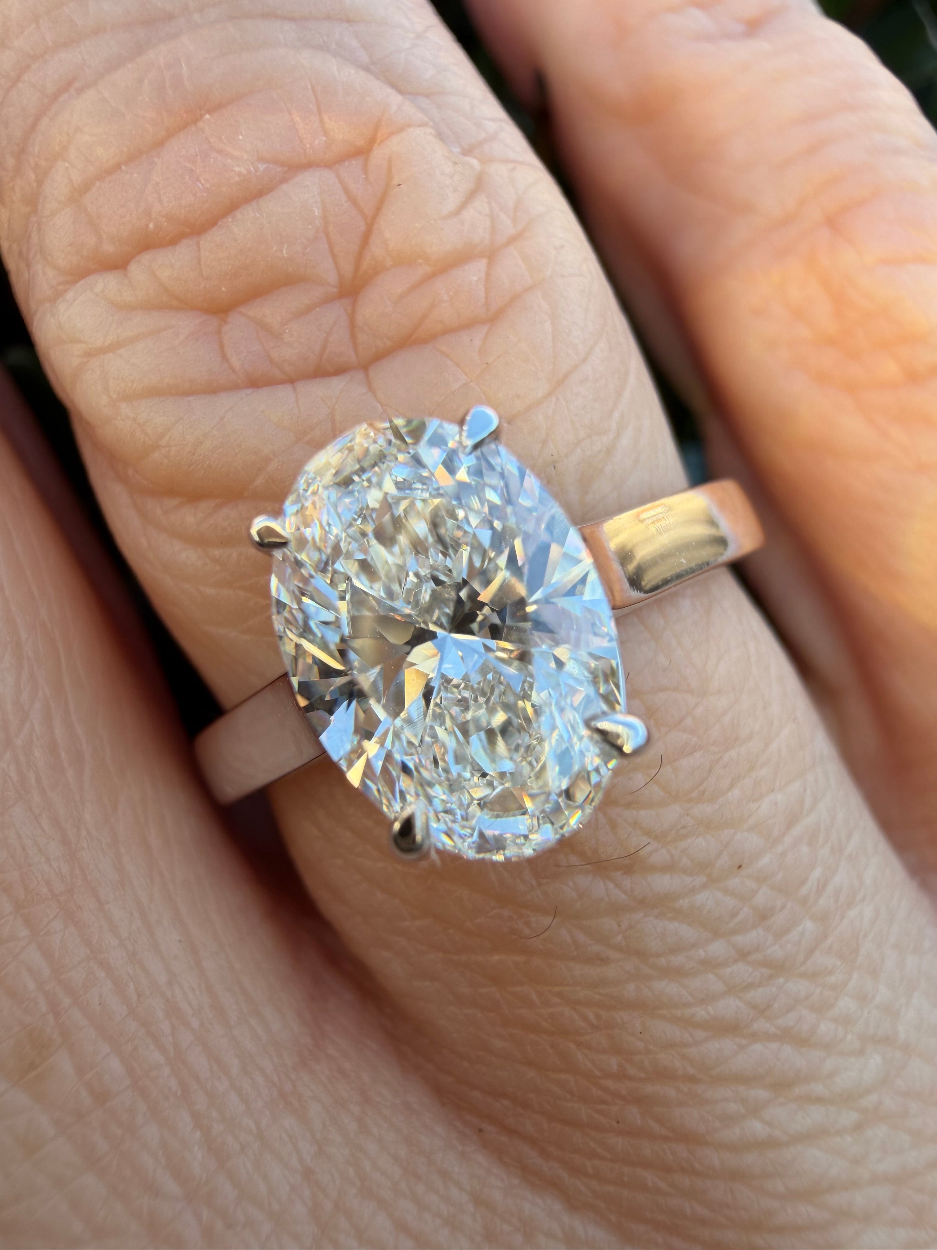 2.01ct oval cut Lab Grown Diamond Solitaire Ring IGI Certified set in 9k white gold