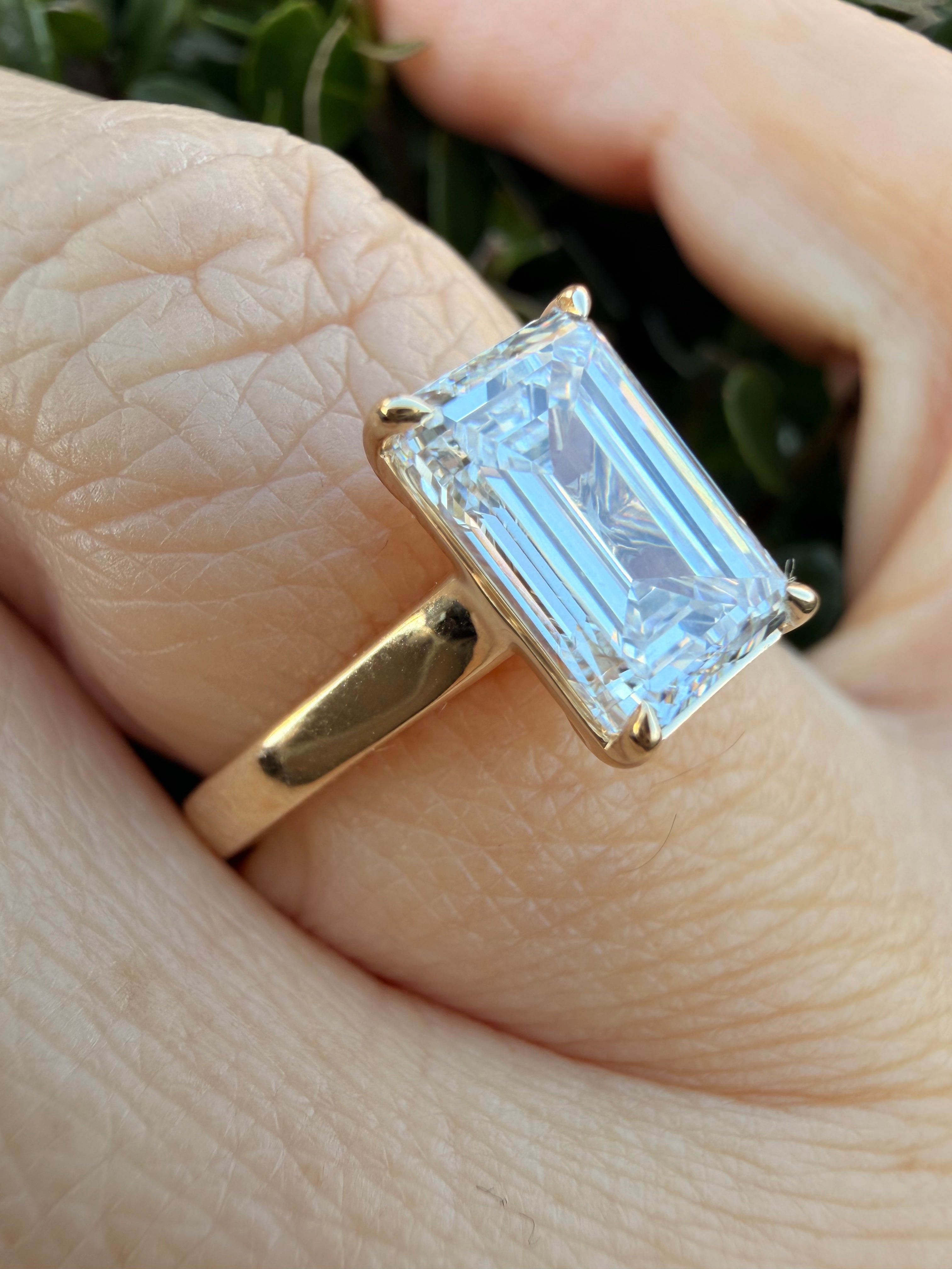 3.01ct emerald cut Lab Grown Diamond Solitaire Ring IGI Certified set in 9k yellow gold