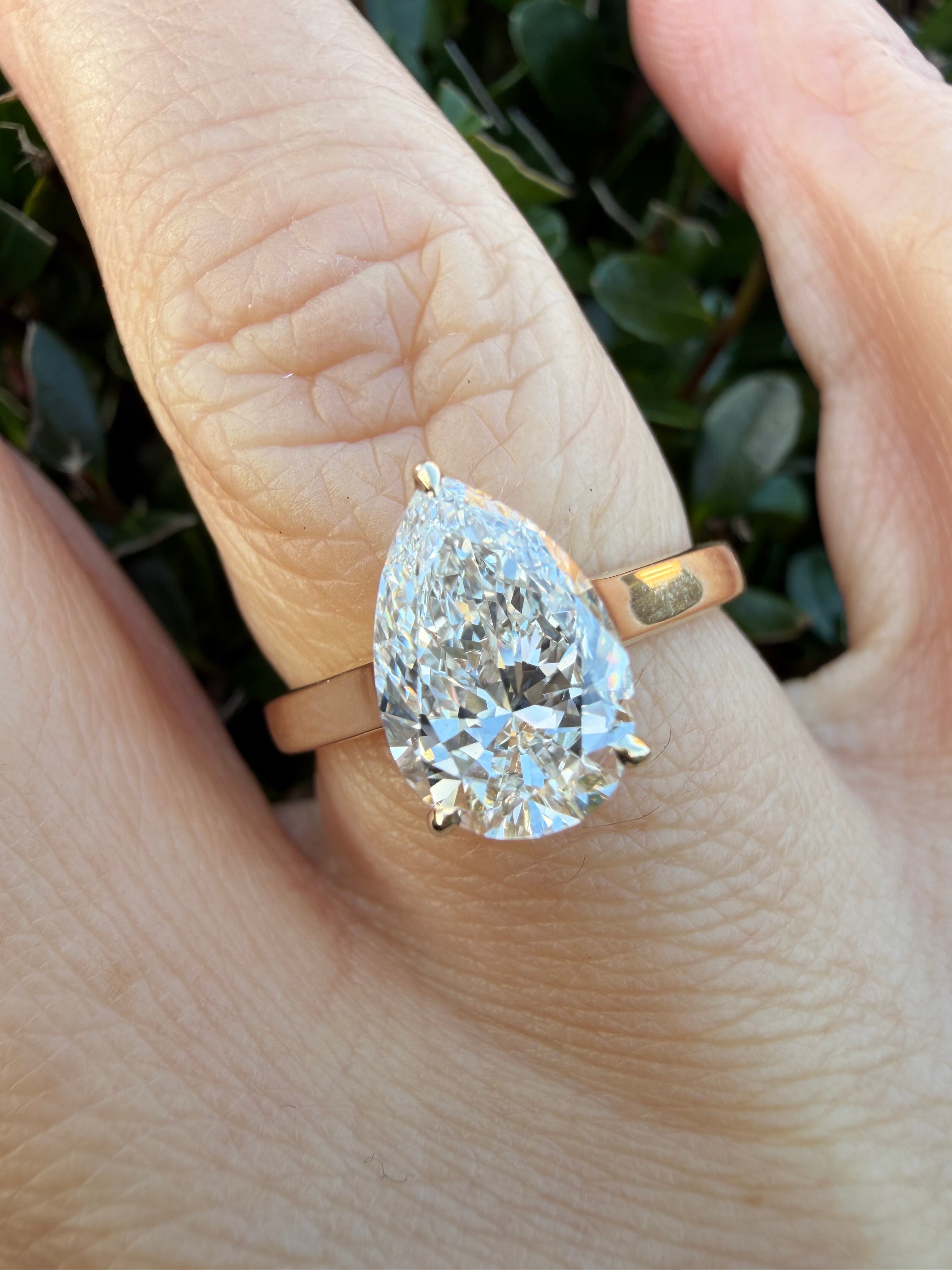 2.04ct pear brilliant cut Lab Grown Diamond Solitaire Ring IGI Certified set in 9k yellow gold