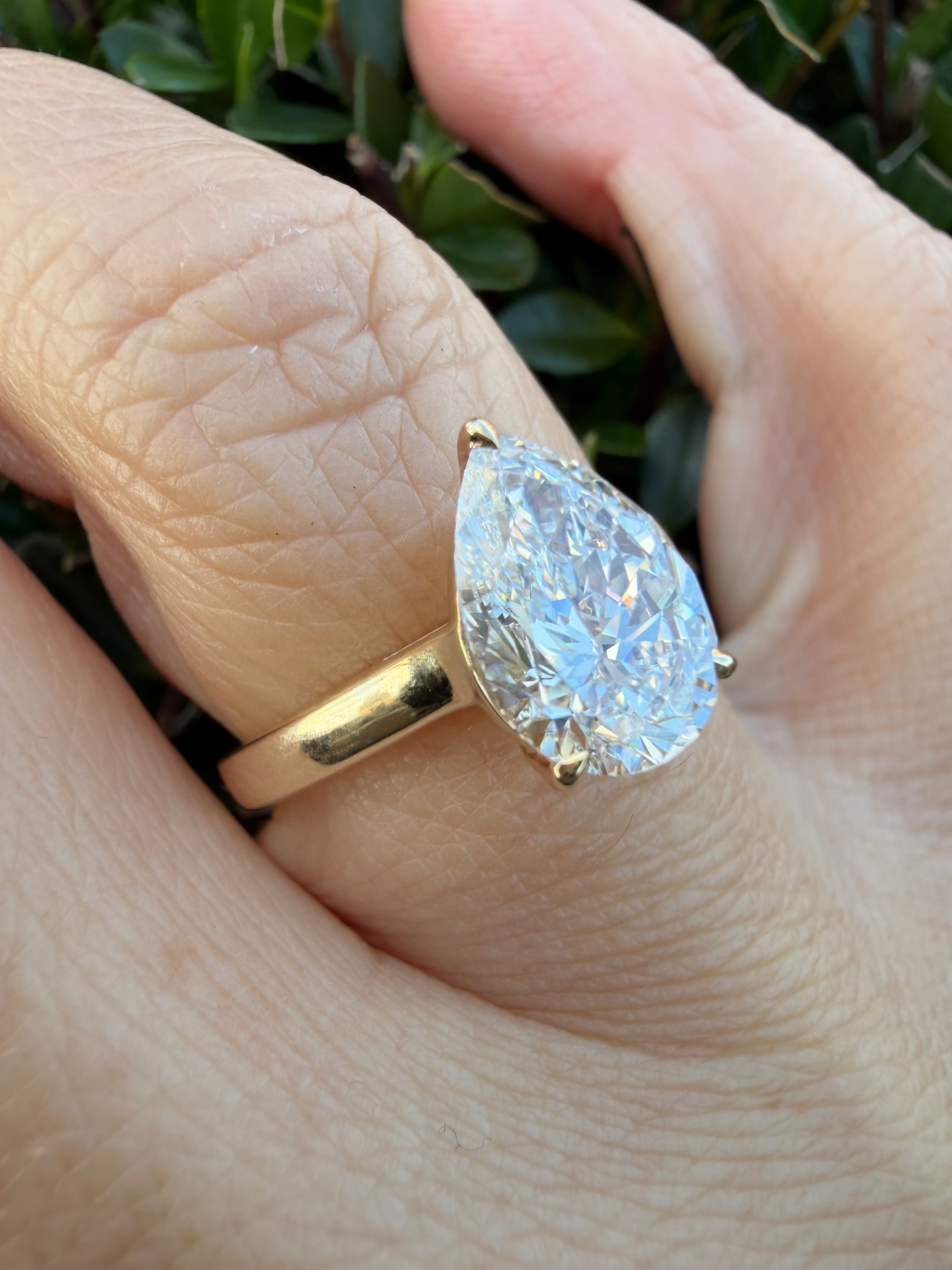 2.04ct pear brilliant cut Lab Grown Diamond Solitaire Ring IGI Certified set in 9k yellow gold