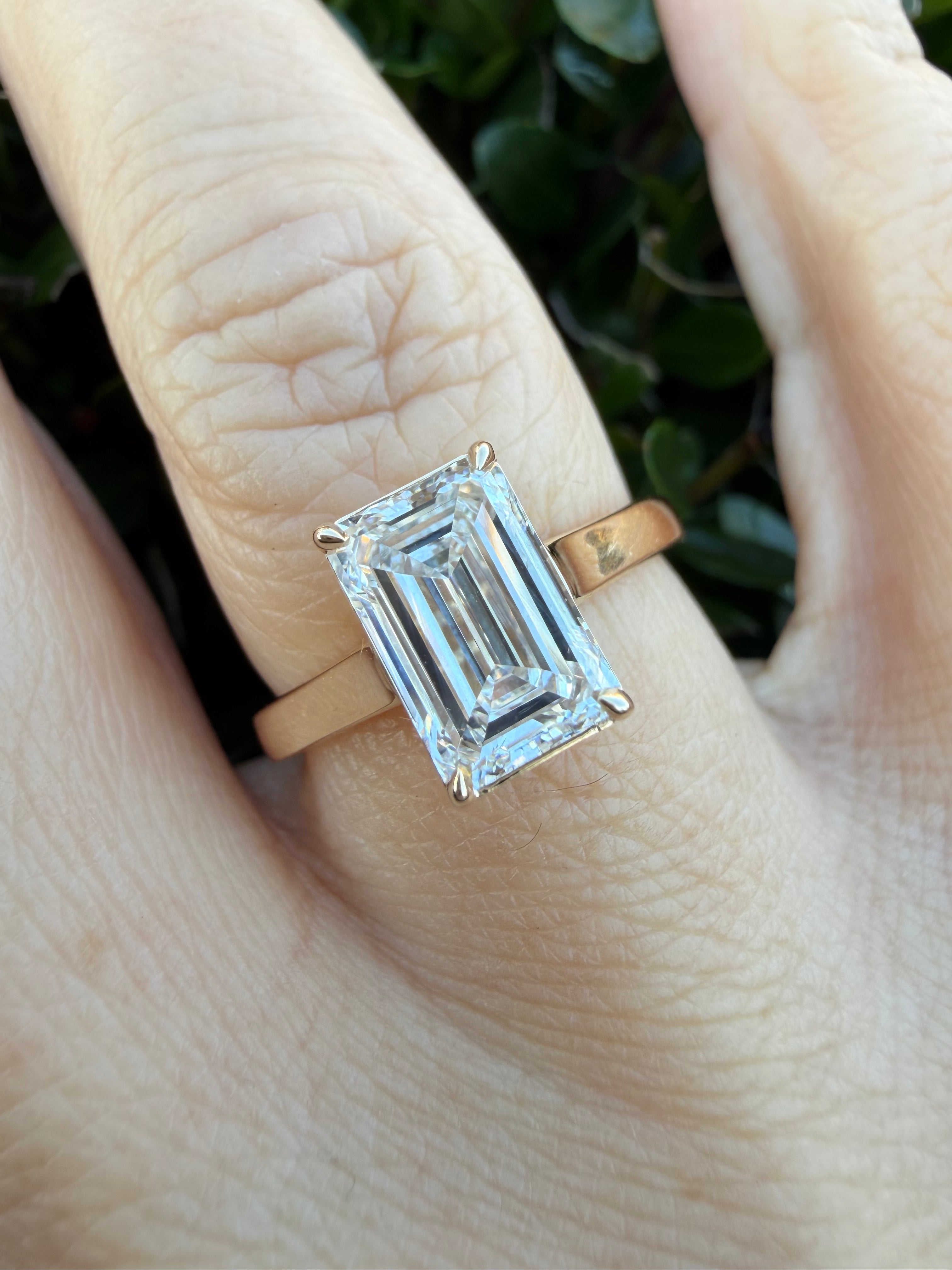 2.08ct emerald cut Lab Grown Diamond Solitaire Ring IGI Certified set in 9k yellow gold
